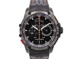 the watch is black and red with a red second hand