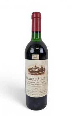 bottle of chateau aussone grand cru, bordeaux, france
