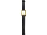 a close up of a watch on a white background