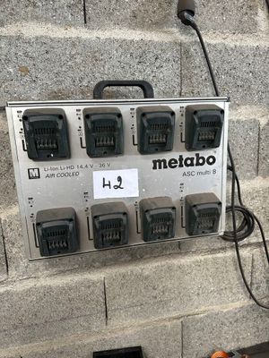 a metal box with a bunch of wires attached to it