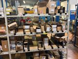many boxes on the shelves in the warehouse