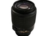 a camera lens that is sitting on a white surface