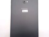 a close up of the back of a black samsung phone