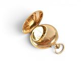 an image of a gold pocket watch with a chain on a white surface