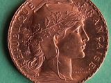 a close up of a coin with a woman ' s face on it