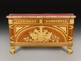 an antique wooden chest with a marble top and gold decoration