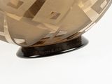 a large glass bowl with a geometric design on it