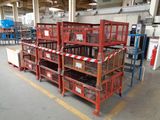 many crates that are stacked on top of each other