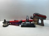 several different types of vacuum cleaners on a table