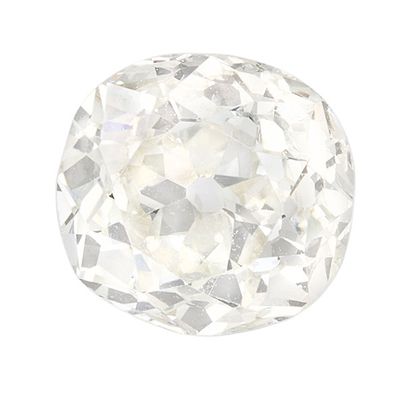 un gros plan d'un diamant blanc sur fond blanc
