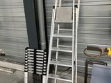a ladder that is leaning against a wall in a garage