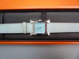 an image of a watch in a box on a table
