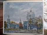 a picture of a painting of a church on a chair