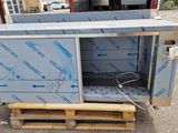 an image of a microwave oven with its door open on a pallet