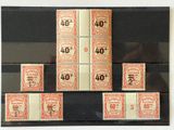 une image représentant une photo d'une série de timbres sur lesquels figurent des chiffres