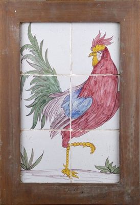 une photo d'un carreau sur lequel figure un coq