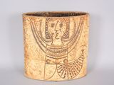 a vase with a picture of a man and a woman on it