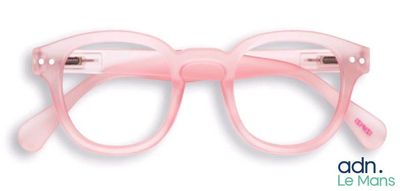 des lunettes roses à verres transparents sur fond blanc, avec les mots « adn le mans »