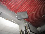 a laptop sitting on top of a table in a room