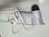a hair dryer that is sitting on top of a counter