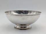 silver plated bowl on pedestal on white background with white background