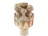 a small vase with animals in it on a white surface