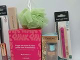 a box of makeup products and a sponge on a table