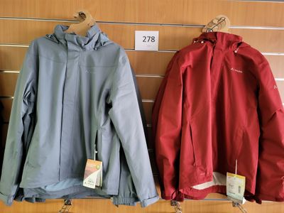 two jackets hanging on a wall in a store