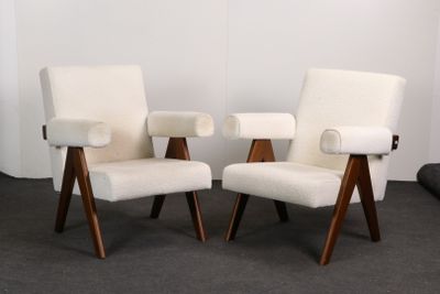 pair of mid - century danish lounge chairs in white wool and walnut