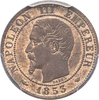 Gros plan sur une pièce de monnaie portant le visage d'un homme