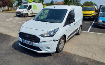 a white van that is parked in a parking lot