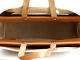 a purse that is open on a white surface