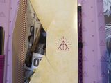 a picture of a harry potter notebook with a pen in it