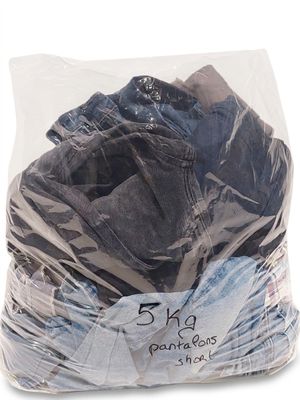 a bag of clothes wrapped in plastic on a white background