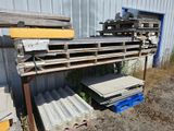 a pile of wood and metal on the ground