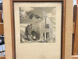 a picture of a picture of an old building on a easel