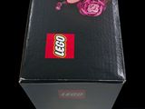 a black box with a picture of a girl and a teddy bear on it