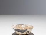 a small bowl that is sitting on a table