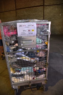 a metal cart with a lot of items on top of it