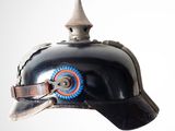 a black helmet with a blue and orange emblem on it