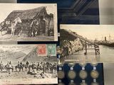 a display case with old photos of people and horses