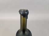 a bottle of wine that is sitting on a table