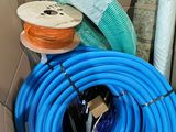 a box full of different types of hoses in it