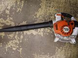a small blower that is sitting on the floor