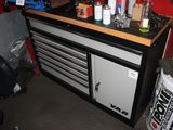 a picture of a workbench with a lot of tools on top of it