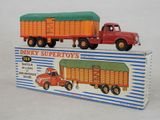 a toy truck and a toy truck in a box
