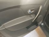 a close up of a car door handle with the door handle open
