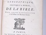an open book with a picture of a tree on it