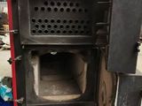 a black oven that is inside of a building