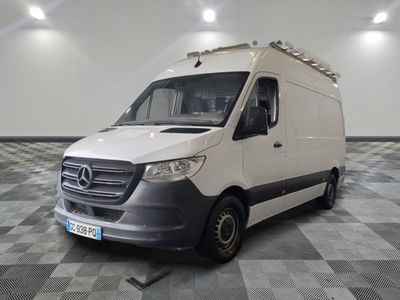 a white van that is parked on a checkered floor